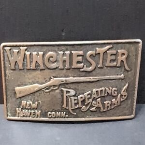 VGT, Brass Collectible Belt Buckle Features Winchester Repeating Arms Logo.